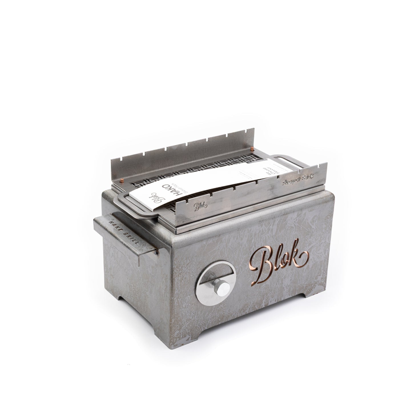 Elegant outdoor Blok Hako Table Grill with patina finish and grill features