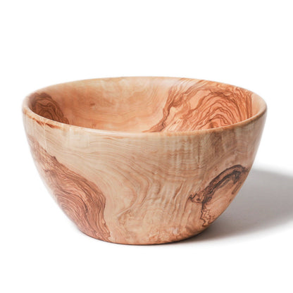 Delicate olivewood salad bowl with a natural color and ornate details