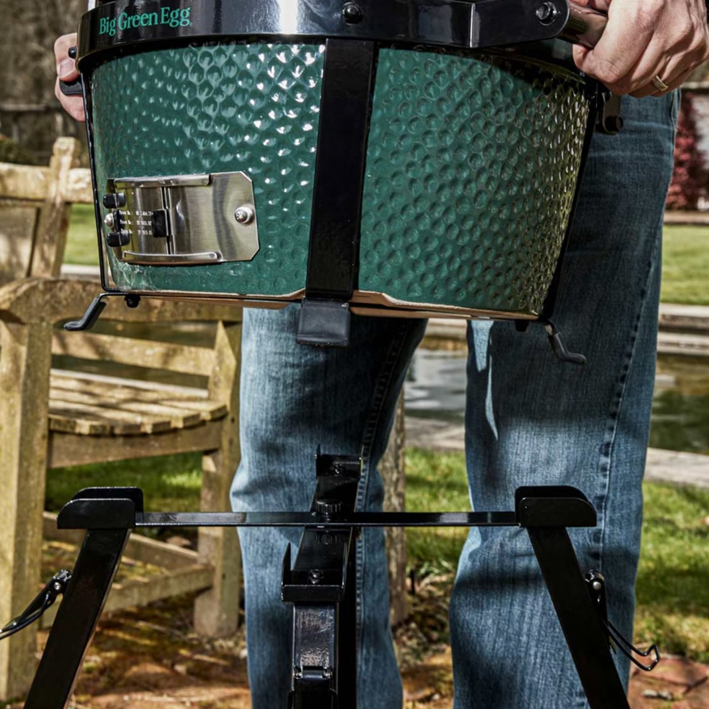 Big Green Egg Mini-Max Portable Ceramic Kamado Grill with Stand in outdoor setting