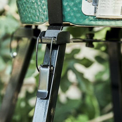 Big Green Egg Mini-Max Portable Ceramic Kamado Grill with Stand's foldable stand in use
