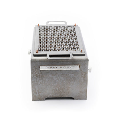 Durable Blok Hako Table Grill in patina finish for outdoor grilling