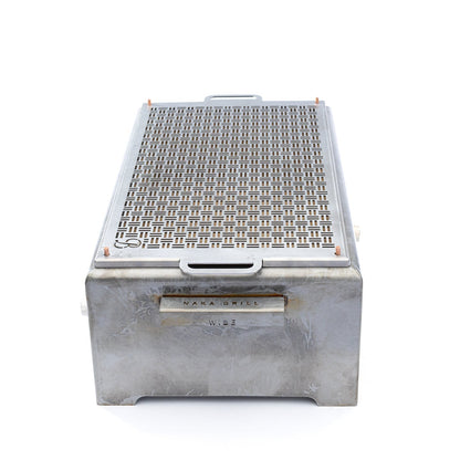 Elegant Blok Naka Table Grill featuring a Patina finish