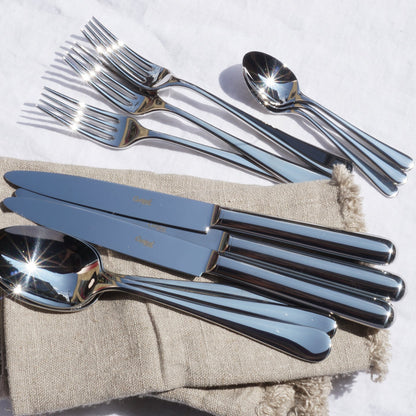 Cutlery set with 24 polished pieces by Cutipol Atlantico featuring premium materials