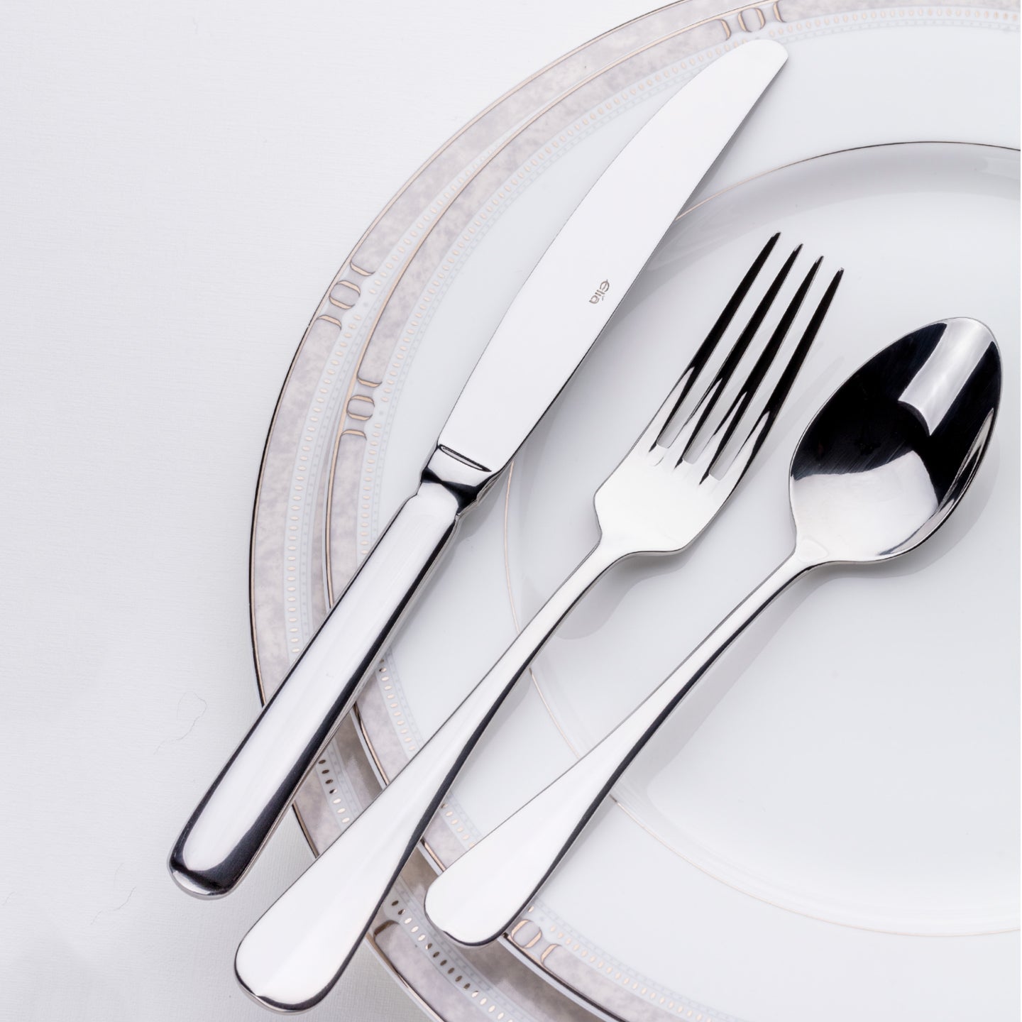 Avignon 16-piece stainless steel cutlery set in a professional kitchen.