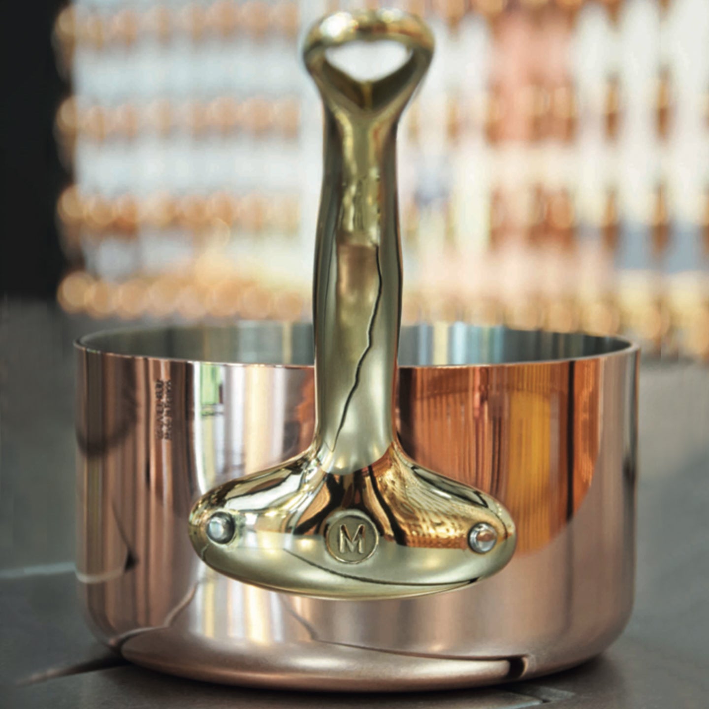 Copper Mauviel M'200B saucepan with lid, perfect for cooking and entertaining