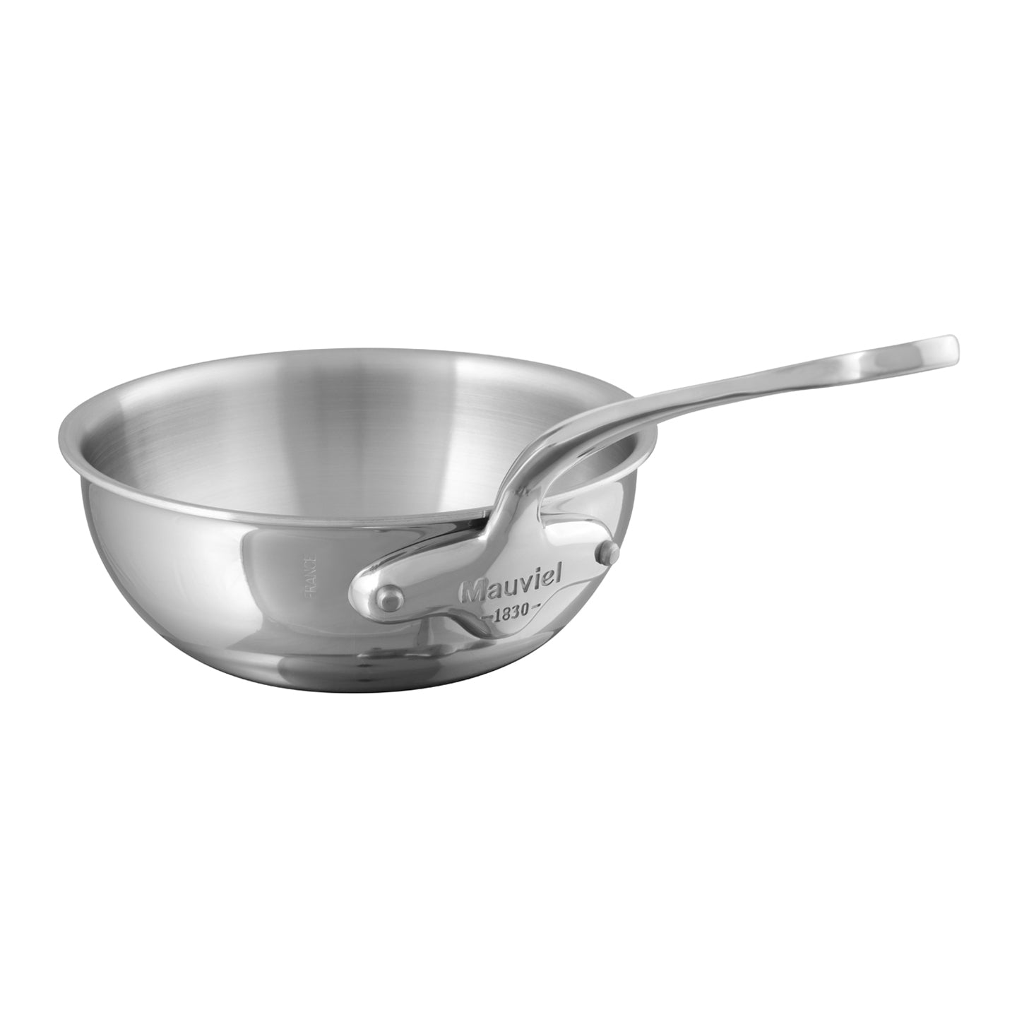 Mauviel M'cook curved splayed stainless steel sauté pan in kitchen setting